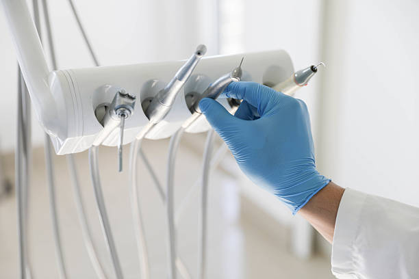 Professional Tooth Extraction technician working in Waxhaw, NC